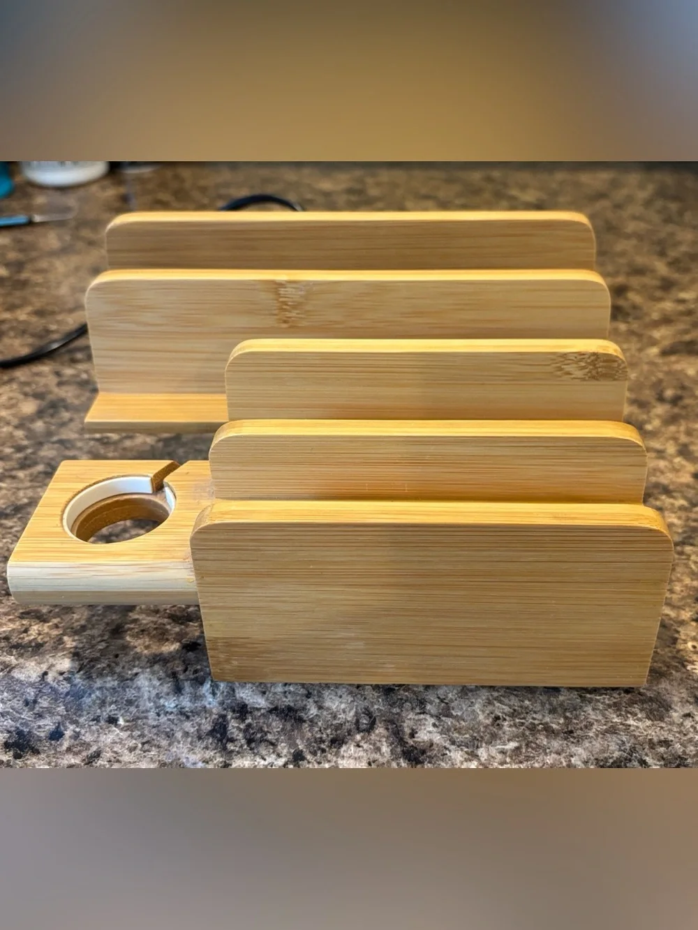 Bamboo organizer charging station with Apple Watch holder and 5 usb ports.